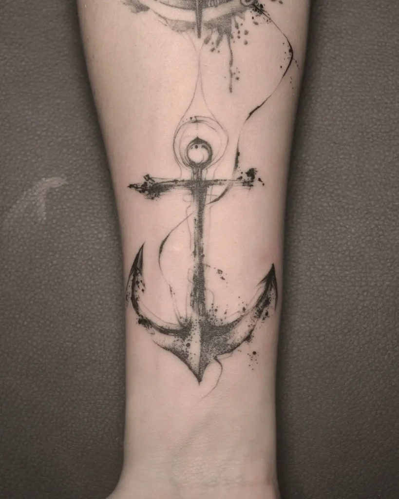 Tatouage d'une ancre marine sur le bras homme