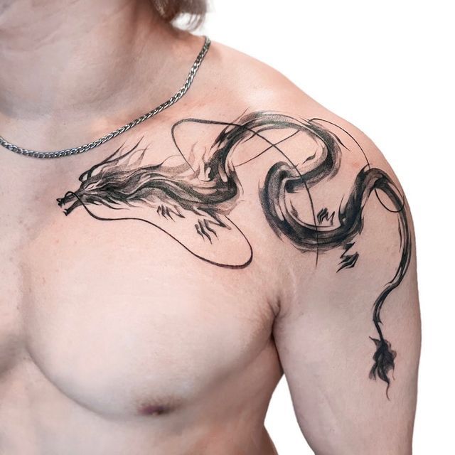 Tatouage dragon torse.