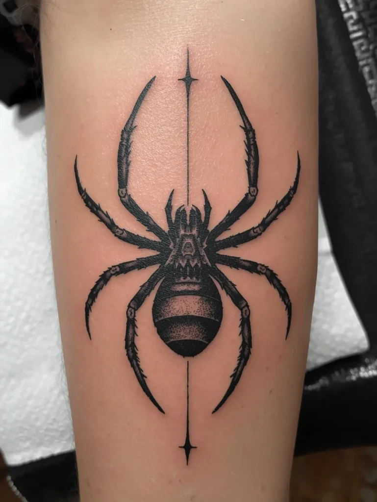 Tatouage d'araignée sur l'avant bras homme