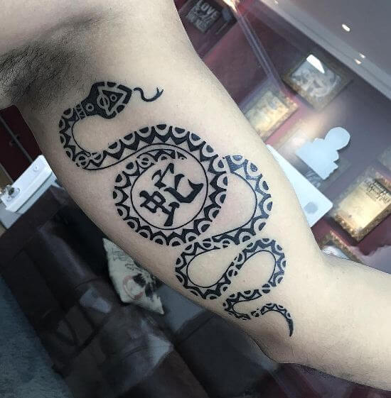 https://wikitattoo.fr/wp-content/uploads/snake-maori-tattoos.jpg
